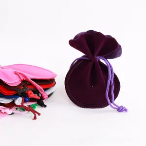 Detailed set of multi-colored velvet drawstring jewelry pouches with reinforced stitching
