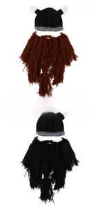 Detail of Viking knit hats with white horns and long beards in black and coffee colors