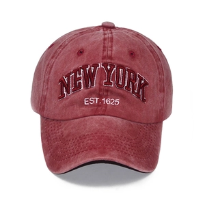 Vintage washed red cotton baseball cap with New York embroidery and distressed finish
