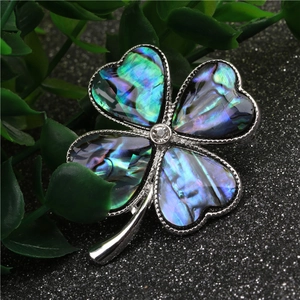 Elegant four-leaf clover brooch with abalone shell and silver finish for women