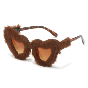 Heart-shaped sunglasses with brown plush faux fur trim and tortoiseshell temples