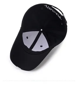 Detail view of cotton baseball cap interior featuring sweatband and adjustable metal buckle