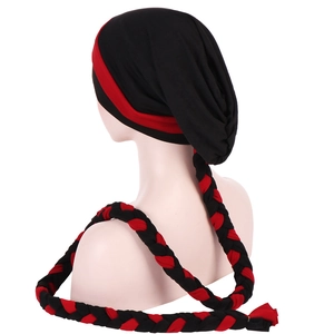 Ethnic milk silk turban hat featuring black and red braided ponytail tassels