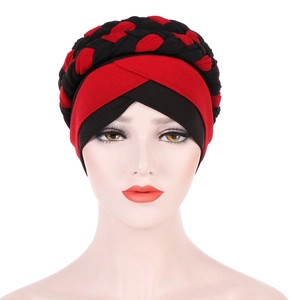 Close-up of the braided crossover detail on a black and red two-tone turban headwrap