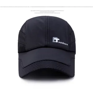 Detail of black quick-dry outdoor hat featuring breathable side mesh and outdoors logo