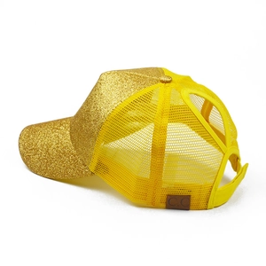 Detail of yellow sequin trucker hat showing pony tail hole and breathable mesh back
