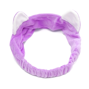 Detailed view of the soft purple and white plush cat ear headband for face washing