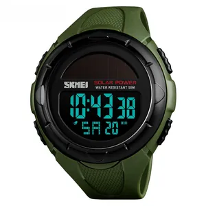 Macro detail of military green solar sports watch showing solar panel and 50M water resistance
