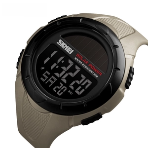 Detail of digital sports watch dial showing solar power feature and 50m water resistance