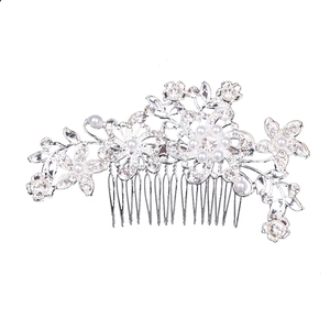 Silver bridal hair comb featuring delicate floral crystals and pearls on a white background