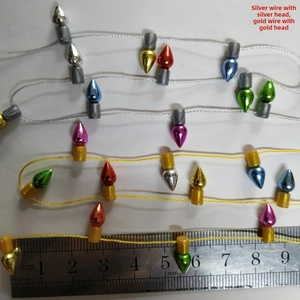 Miniature colorful Christmas bulb ornaments in gold and silver wire options with ruler guide