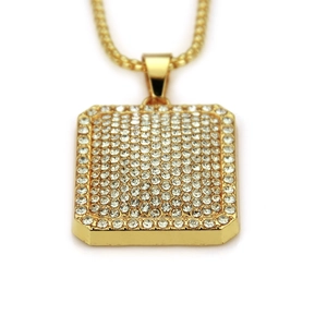 Close-up of hip hop gold square pendant with dense crystal rhinestones and matching chain