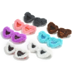 Fuzzy heart-shaped sunglasses in multiple colors featuring soft plush textured frames
