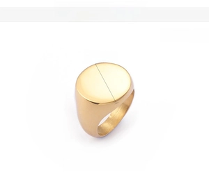 Macro view of 18K gold-plated signet ring showing 18mm width and 9g weight details