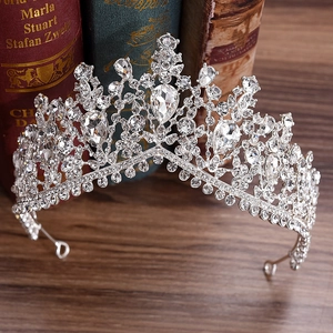 Detail of silver bridal crown with shimmering rhinestones and pear-cut zircon stones