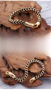 Detailed view of the woven leather texture and 18K gold stainless steel clasp on the bracelet