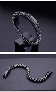 Macro view of vintage titanium steel bracelet with woven texture and mechanical clasp