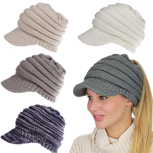 Detailed knit texture of ponytail beanie hats with sun visors in various colors