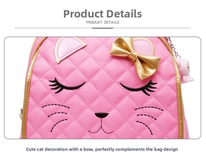 Detail of pink child's backpack featuring diamond quilting and gold bow with cat embroidery