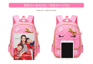 Pink schoolbag size comparison with A4 magazine and iPad showing large capacity