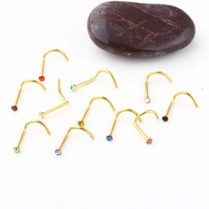 Detailed set of L-shaped gold nose studs featuring multi-colored sparkling rhinestones