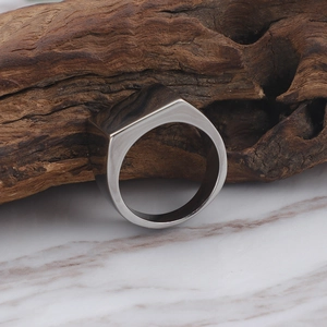 Polished silver stainless steel signet ring with a minimalist flat top geometric design