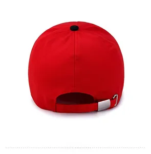 Rear view of red cotton baseball cap featuring an adjustable strap and silver metal buckle
