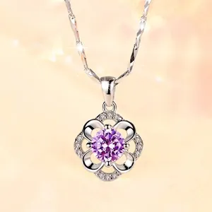 Close-up of S925 silver necklace with purple stone and floral rotating pendant