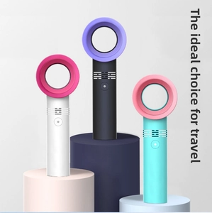 Detailed display of portable bladeless mini fans in three elegant color combinations