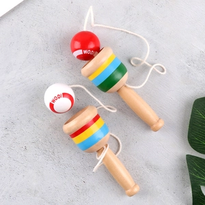 Traditional wooden Kendama skill toys with red and white balls and colorful striped handle
