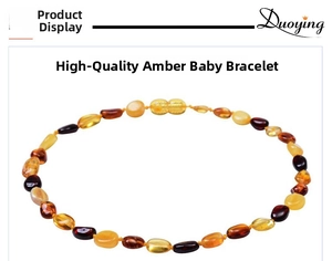 Vue détaillée d'un bracelet en ambre pour bébé avec perles multicolores et fermoir