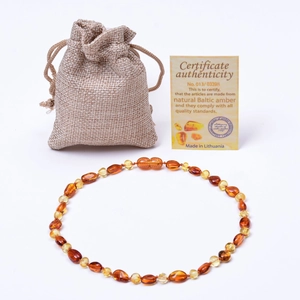 Collier en ambre de la Baltique pour bébé avec pochette en lin et certificat d'authenticité