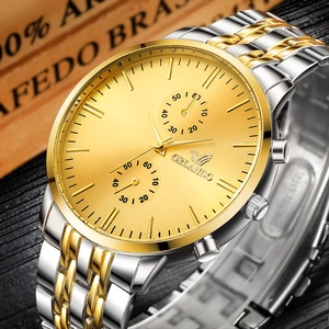Close-up of ORLANDO men's business watch with gold sunray dial and two-tone steel strap