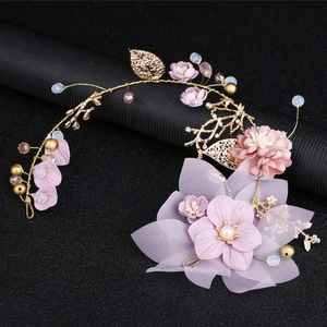 Exquisite bridal floral headband with purple fabric flowers and golden metallic leaves