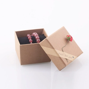 Brown kraft paper jewelry box with black velvet insert and Just for you text detail