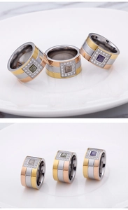 Detailed close-up of tri-color wide ring with square gemstones and pavé set side diamonds