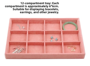 Detail view of pink velvet jewelry tray with 12 slots for earrings and necklaces