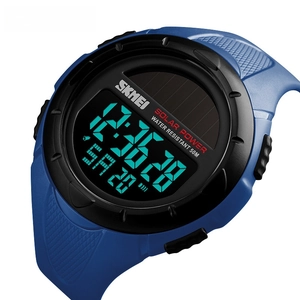 Detail view of solar powered blue sport watch with 50M water resistance and digital display