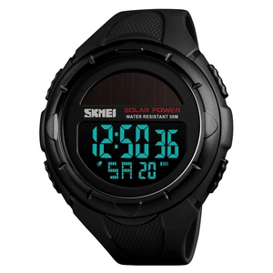 Detail of solar power panel on digital sports watch with water resistant resin case