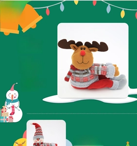 Close-up of reindeer and snowman fabric doll curtain buckles made of non-woven fabric