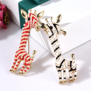 Fashionable giraffe enamel brooch with white pearls and striped pattern on gold base
