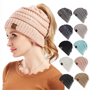 Winter knitted ponytail beanie in soft acrylic with CC logo and multi-color options