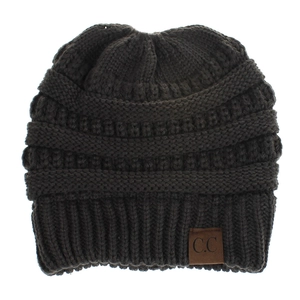 Detailed knit texture and brown leather label on dark gray acrylic ponytail beanie