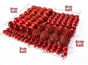 Detail of red Christmas ball ornaments in shiny, matte, and glitter finishes with sizing