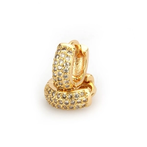 Close-up of gold plated huggie earrings featuring micro-pave white zircon stones