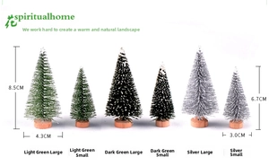 Detailed comparison of six mini pine needle Christmas trees with wooden bases and fake snow