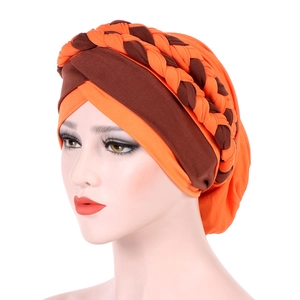 Two-tone turban headwear with braided headband detail in orange and brown tones