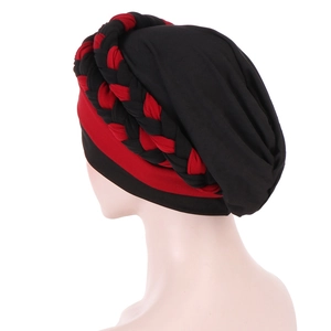 Detail view of red and black braided headscarf with thick knit twist pattern