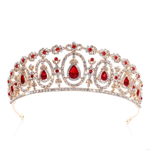 Detailed close-up of bridal crown featuring red teardrop gems and white crystals
