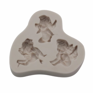 Detailed view of silicone mold with three different angel Cupid shapes for crafts